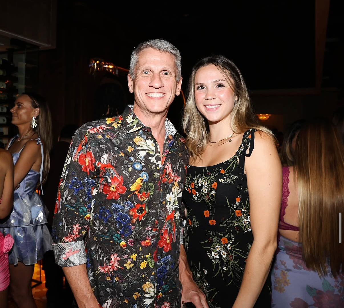 A smiling pair pose together during the 2024 Celebrity Waiter Night reception.
