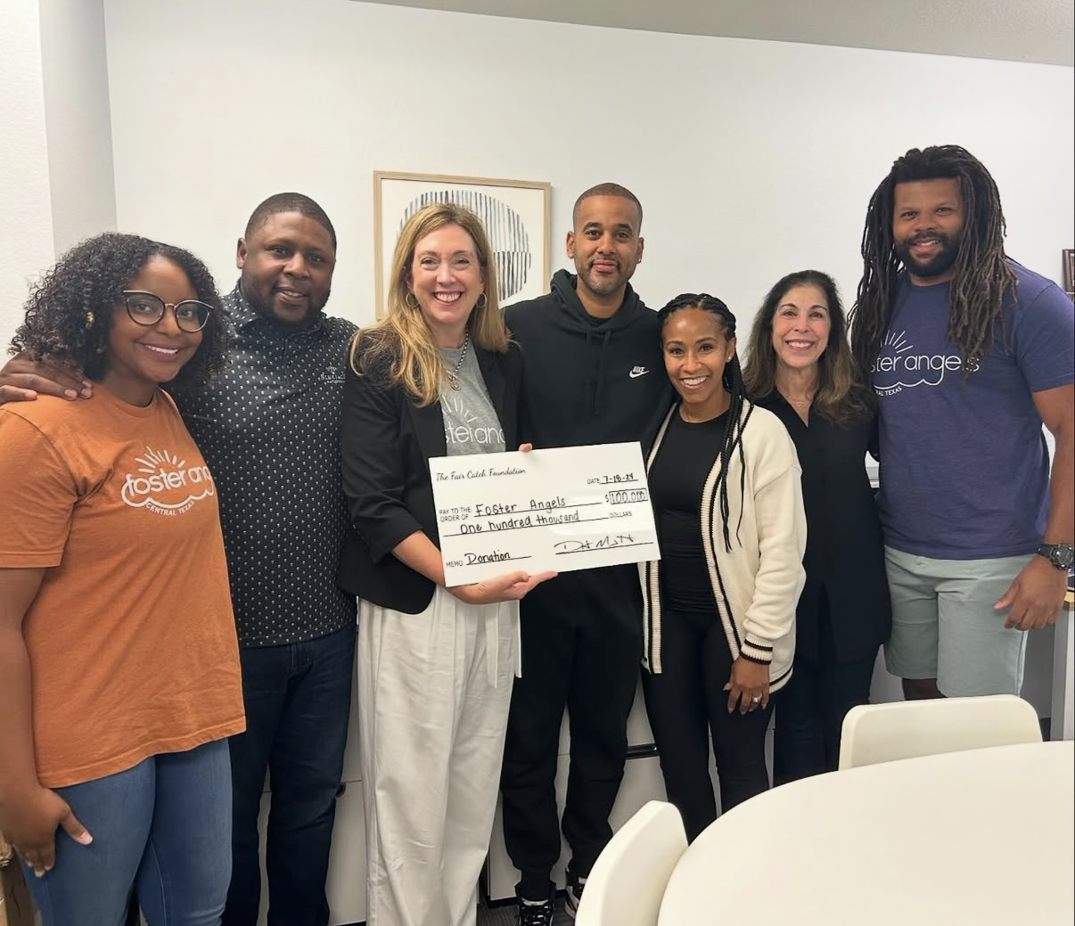The Fair Catch Foundation presenting a $100,000 grant to Foster Angels of Central Texas.