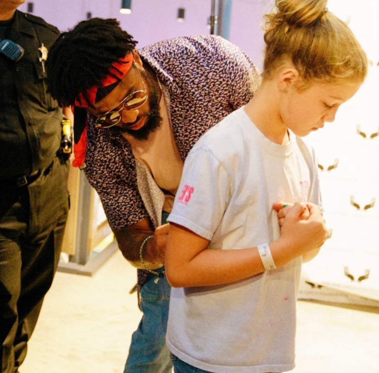 A young fan gets an autograph from an NFL player at the 2018 Bowl with the Pros Charity Event.