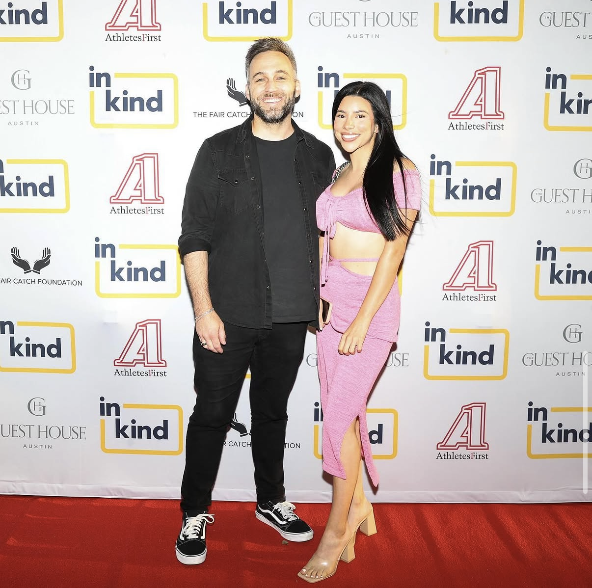Couple posing on the red carpet at the 2024 event.