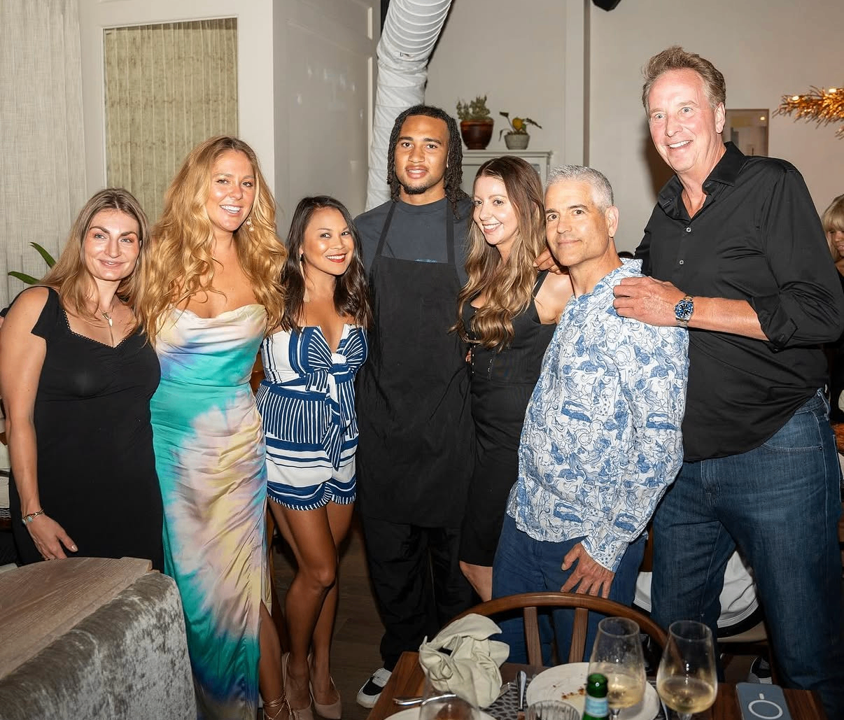 A group photo inside the dining room during the 2024 Celebrity Waiter Night in Austin.