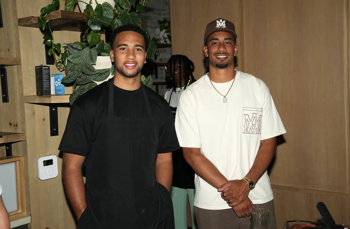 Two guests pose together inside the venue during the 2026 Celebrity Waiter Night.