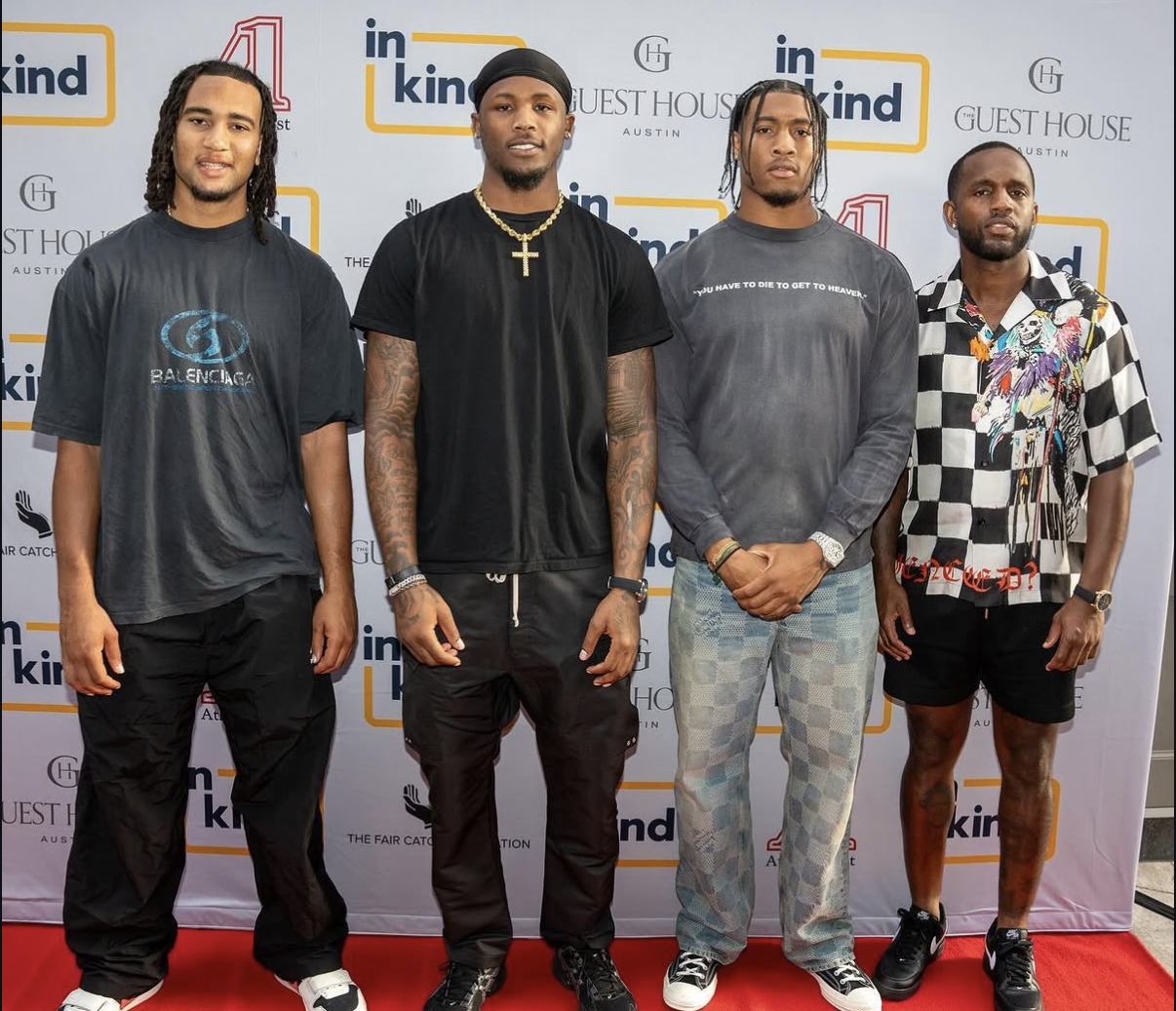 Four guests stand together on the 2024 Celebrity Waiter Night red carpet.
